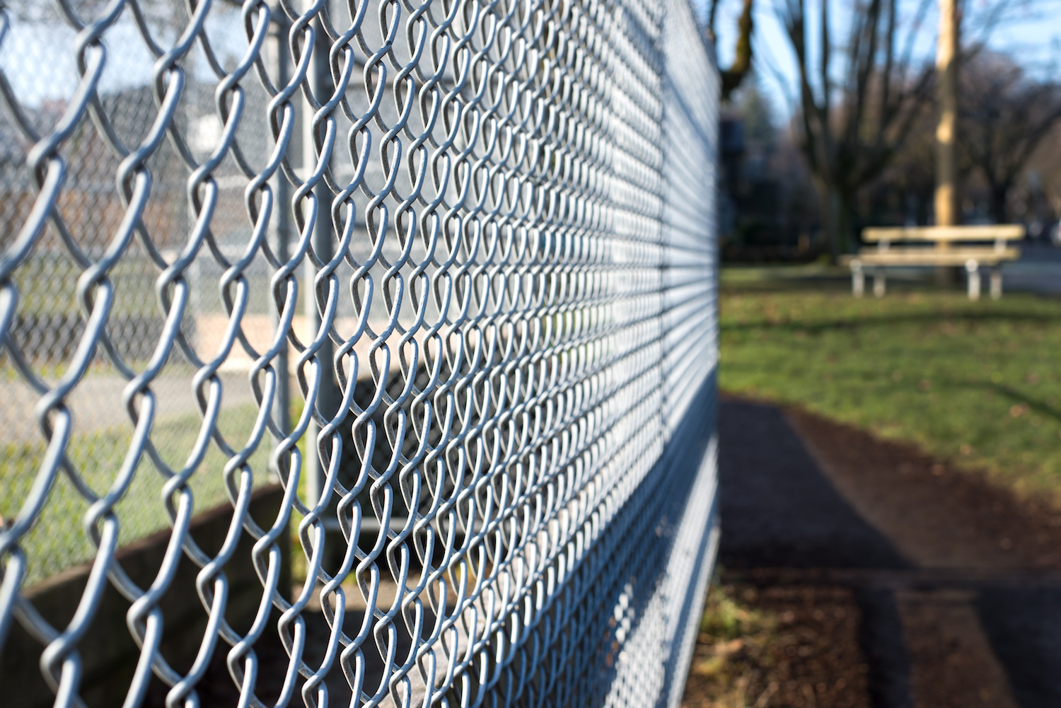 Chain link fencing installed by Fortitude Fencing, providing a secure and visible enclosure for residential or commercial properties.